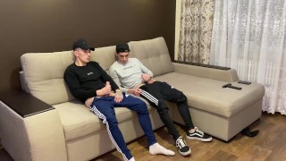 Two friends jerk off in sporwear and cum